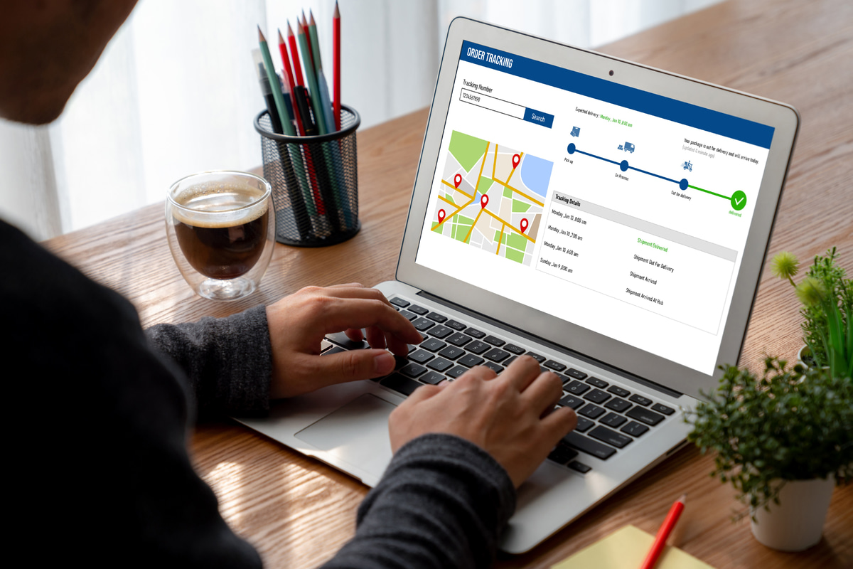 Digital interface showing a permit tracking dashboard with status updates.