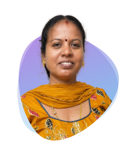 an indian woman wearing a yellow sari