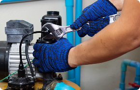 a plumber working on a water heater